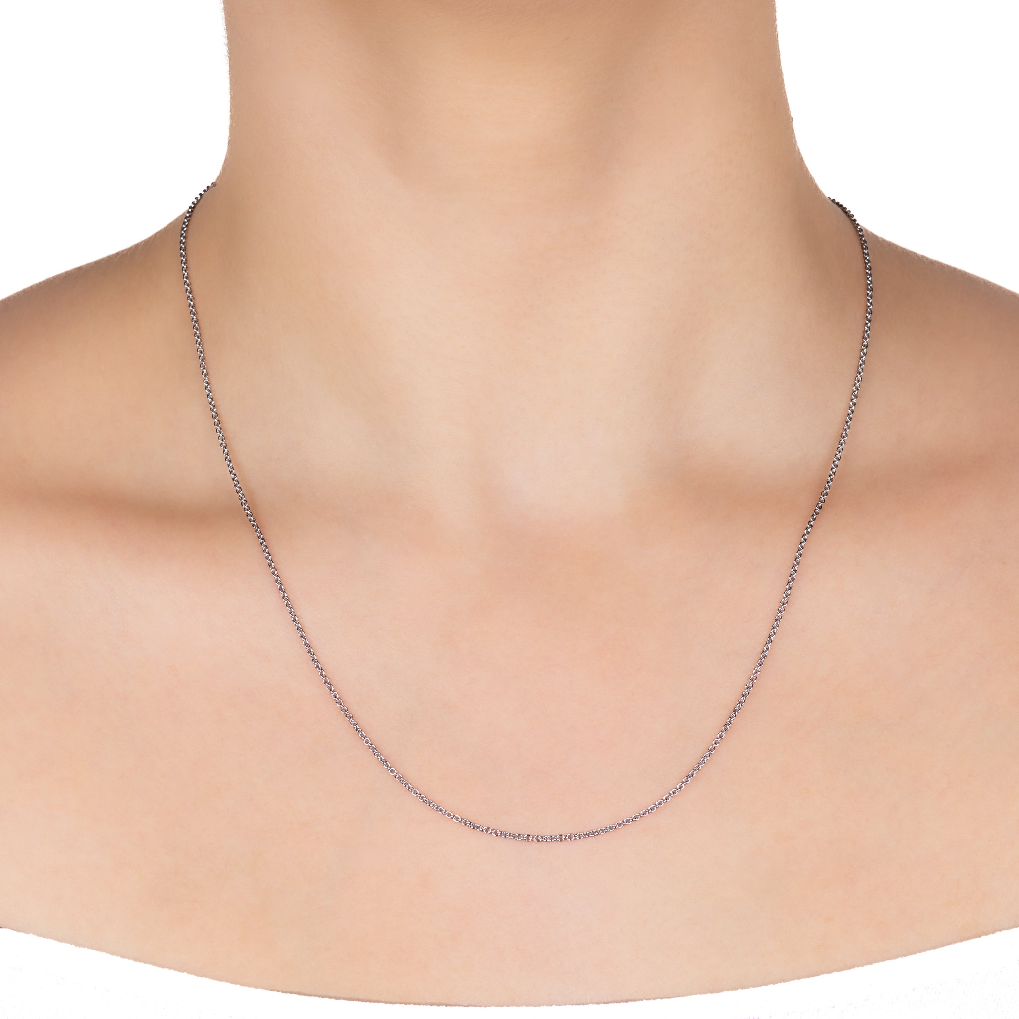 9K White Gold Polished 58cm Adjustable Cable Chain worn on a model with a white background