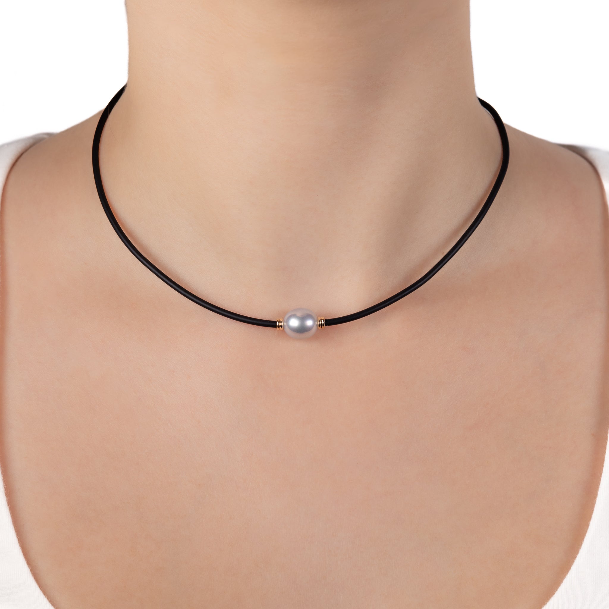 9K Yellow Gold Australian South Sea 10-11mm Cultured Pearl Neoprene Necklace worn around a models neck