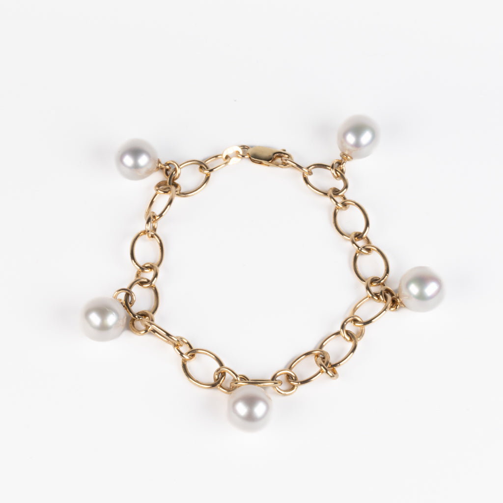 9K Yellow Gold Australian South Sea 10-11 mm Cultured Pearl Bracelet viewed from the top on white background