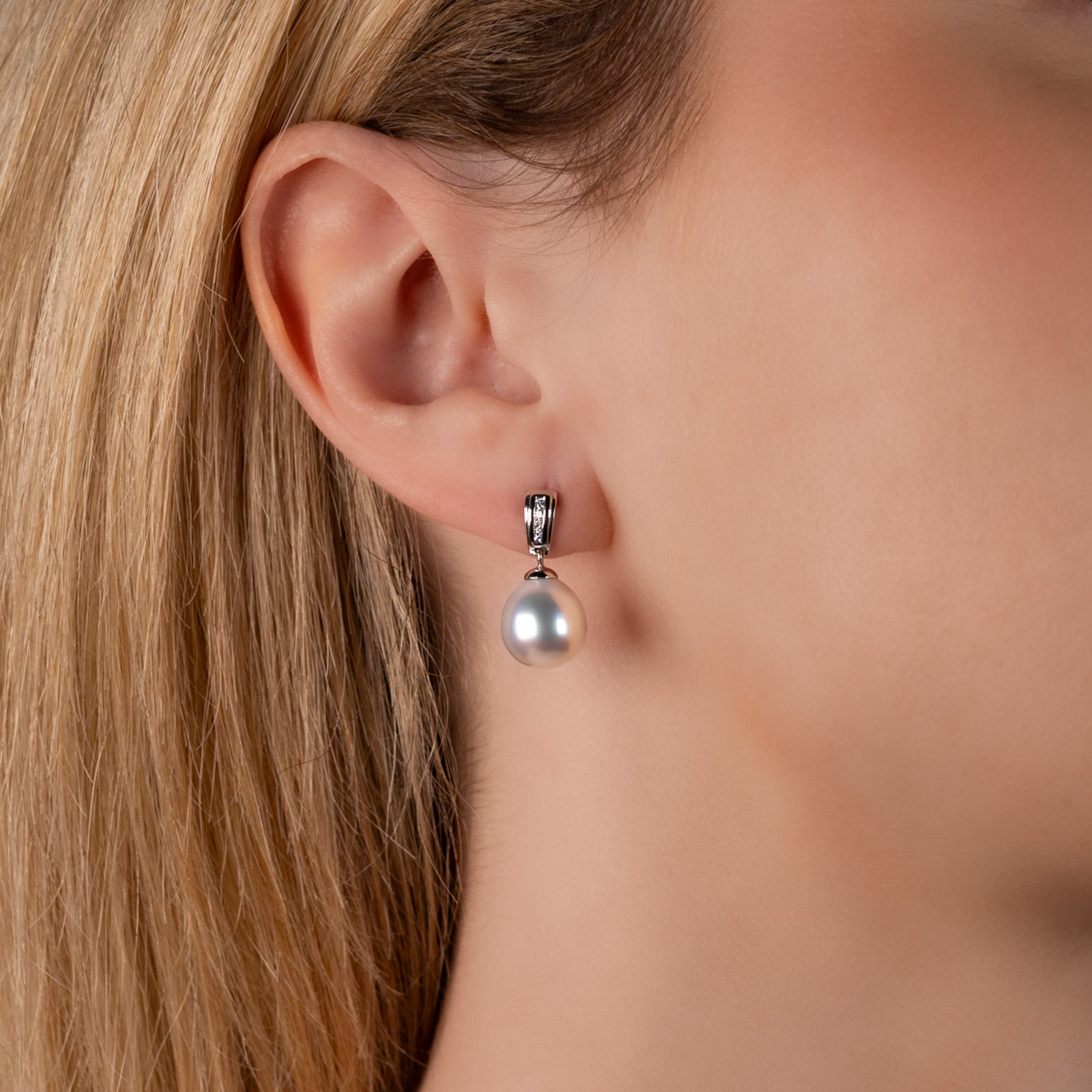 18K White Gold Australian South Sea 10-11mm Cultured Pearl and Diamond Drop Earrings on a model