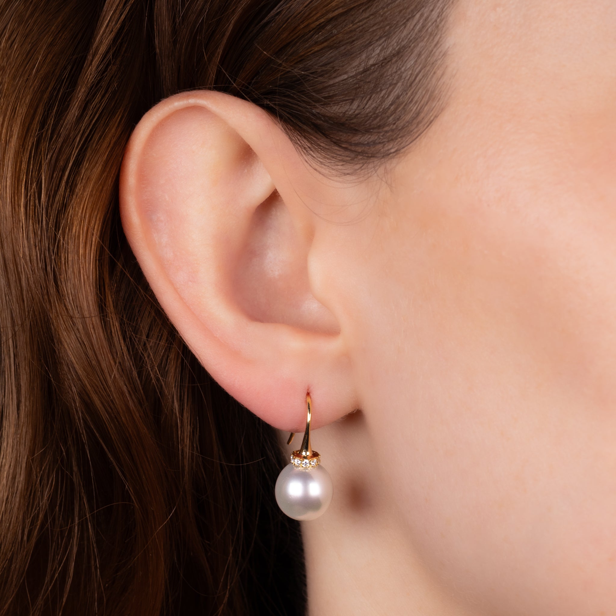 18K Yellow Gold Australian South Sea 10-11 mm Cultured Pearl and Diamond Hook Earrings worn on a model