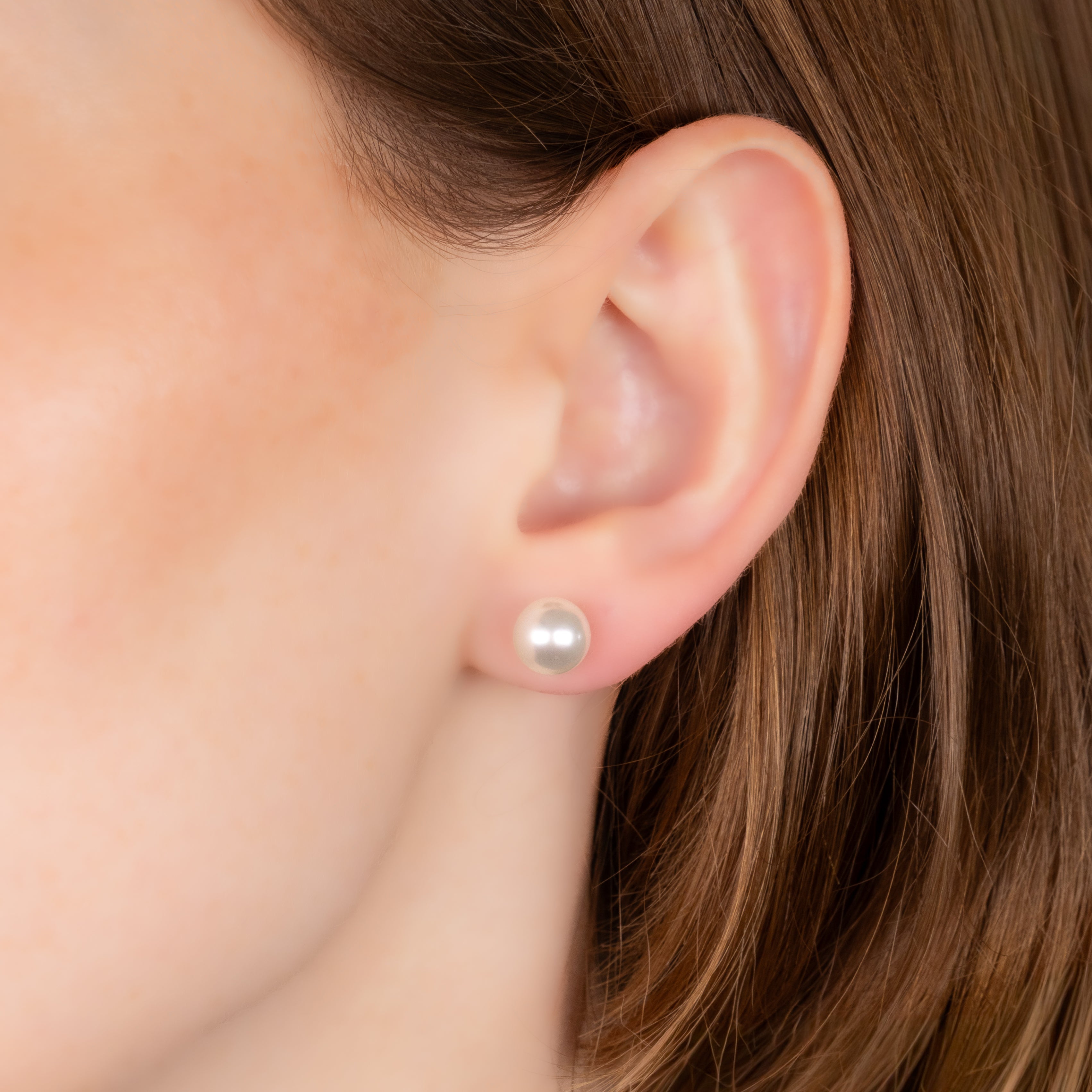 9K Yellow Gold Australian South Sea 8-9 mm Cultured Pearl Stud Earrings on a model