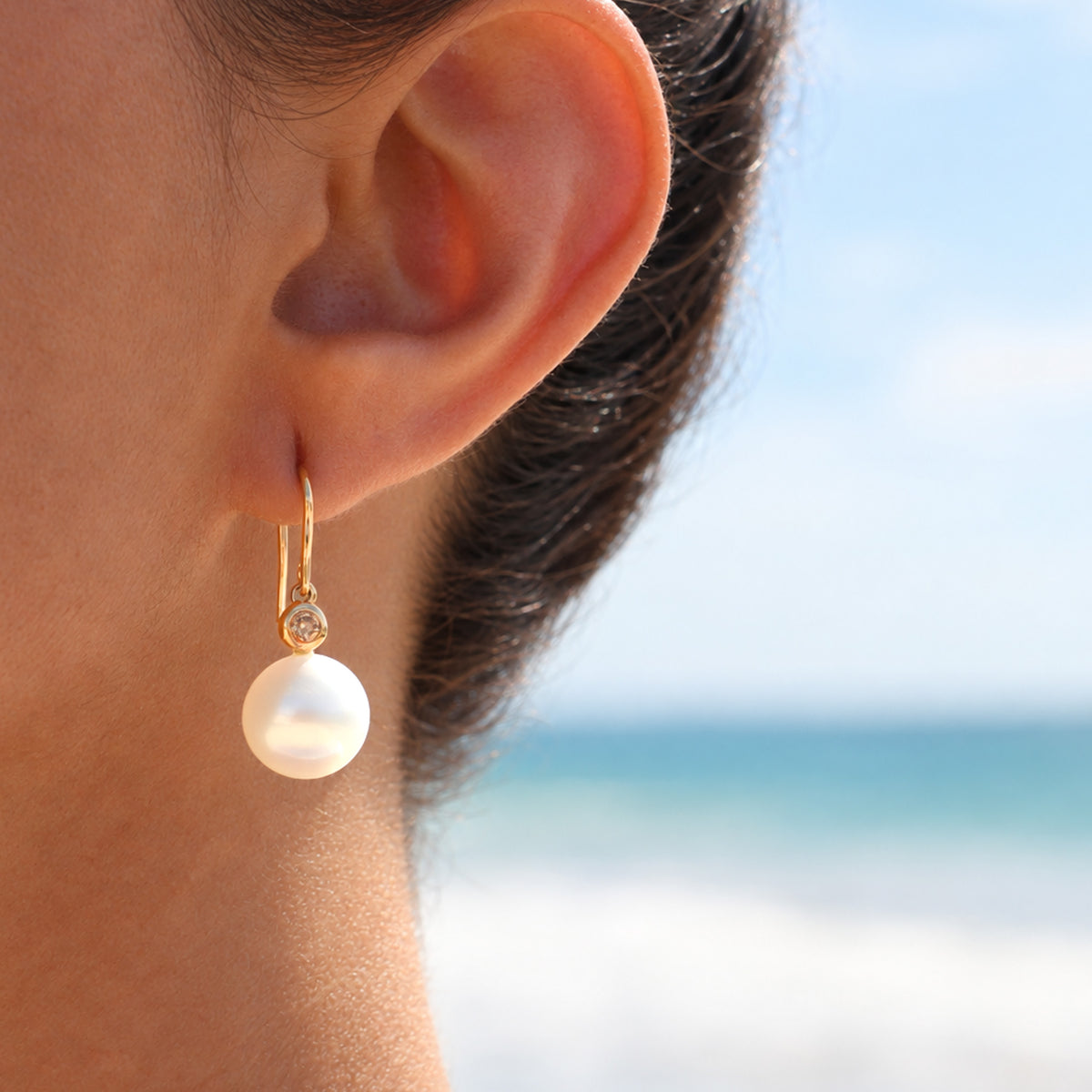 9K Yellow Gold Australian South Sea Cultured 11-12 mm Pearl and Argyle Diamond Hook Earrings on model