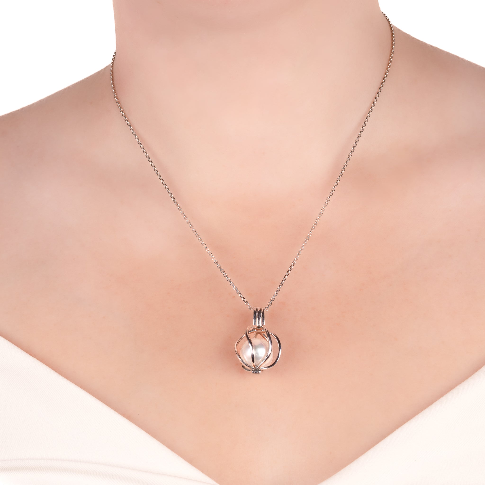 Sterling Silver South Sea 12-13 mm Cultured Curved Cage Pearl Pendant on a model