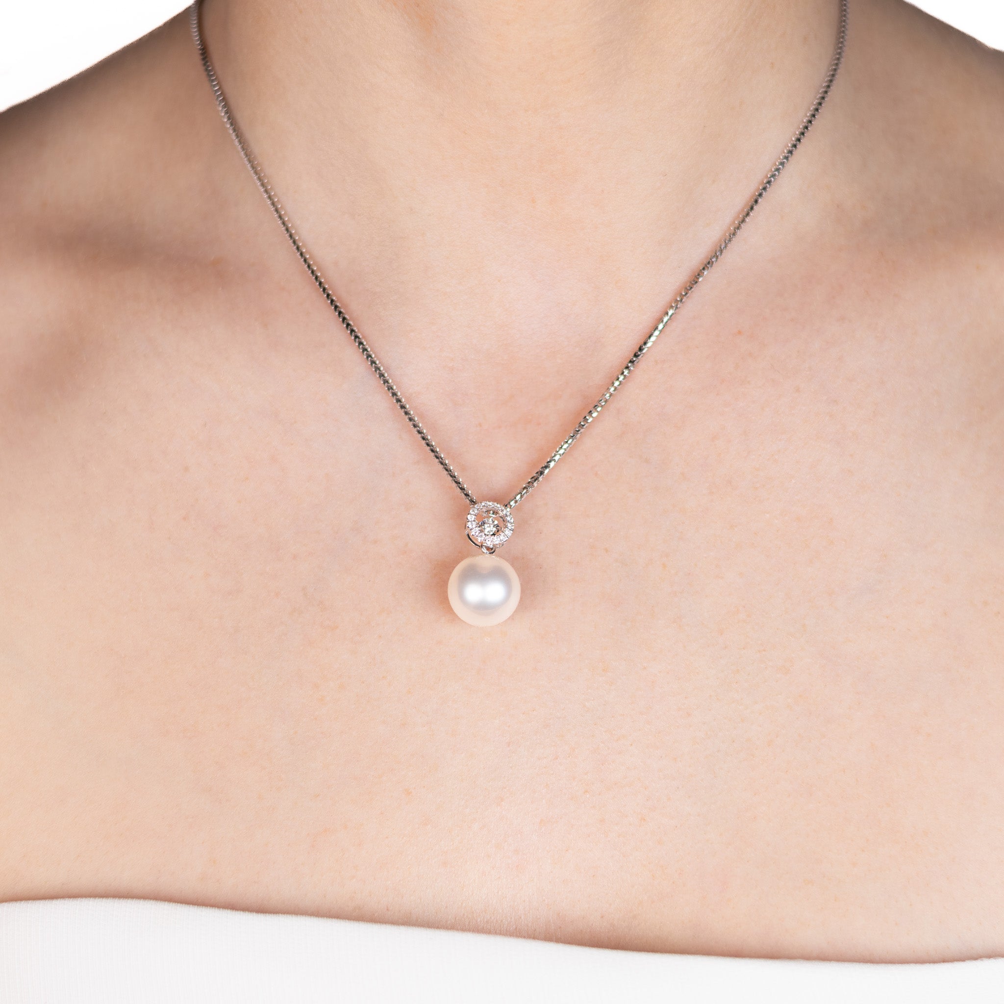 18K White Gold Australian South Sea 13-14mm Cultured Pearl and Diamond Pendant worn on a model