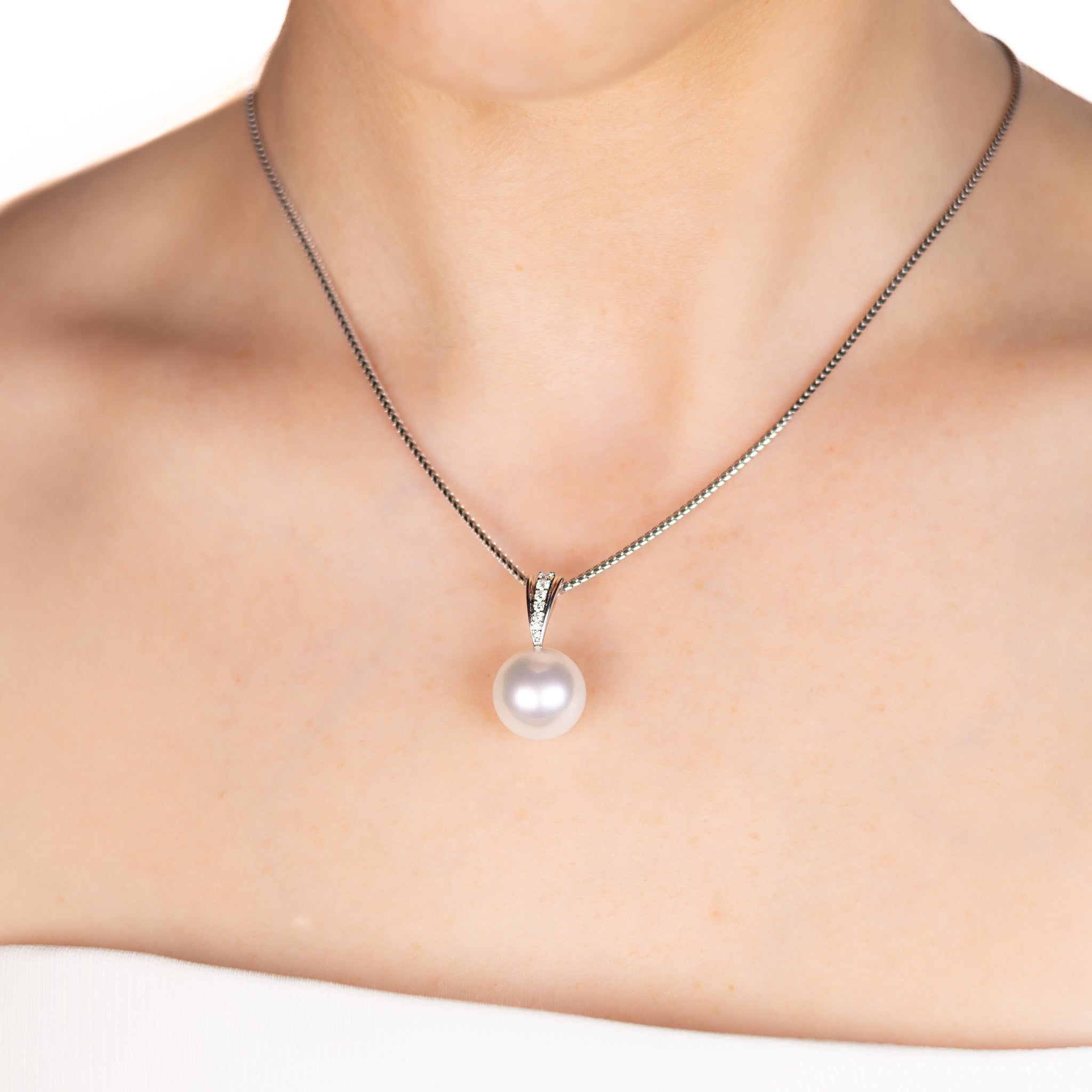 18K White Gold Australian South Sea 14-15mm Cultured Pearl and Diamond Pendant worn on a model