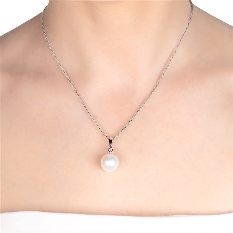 18K White Gold Australian South Sea 13-14mm Cultured Pearl and Diamond Pendant on a model