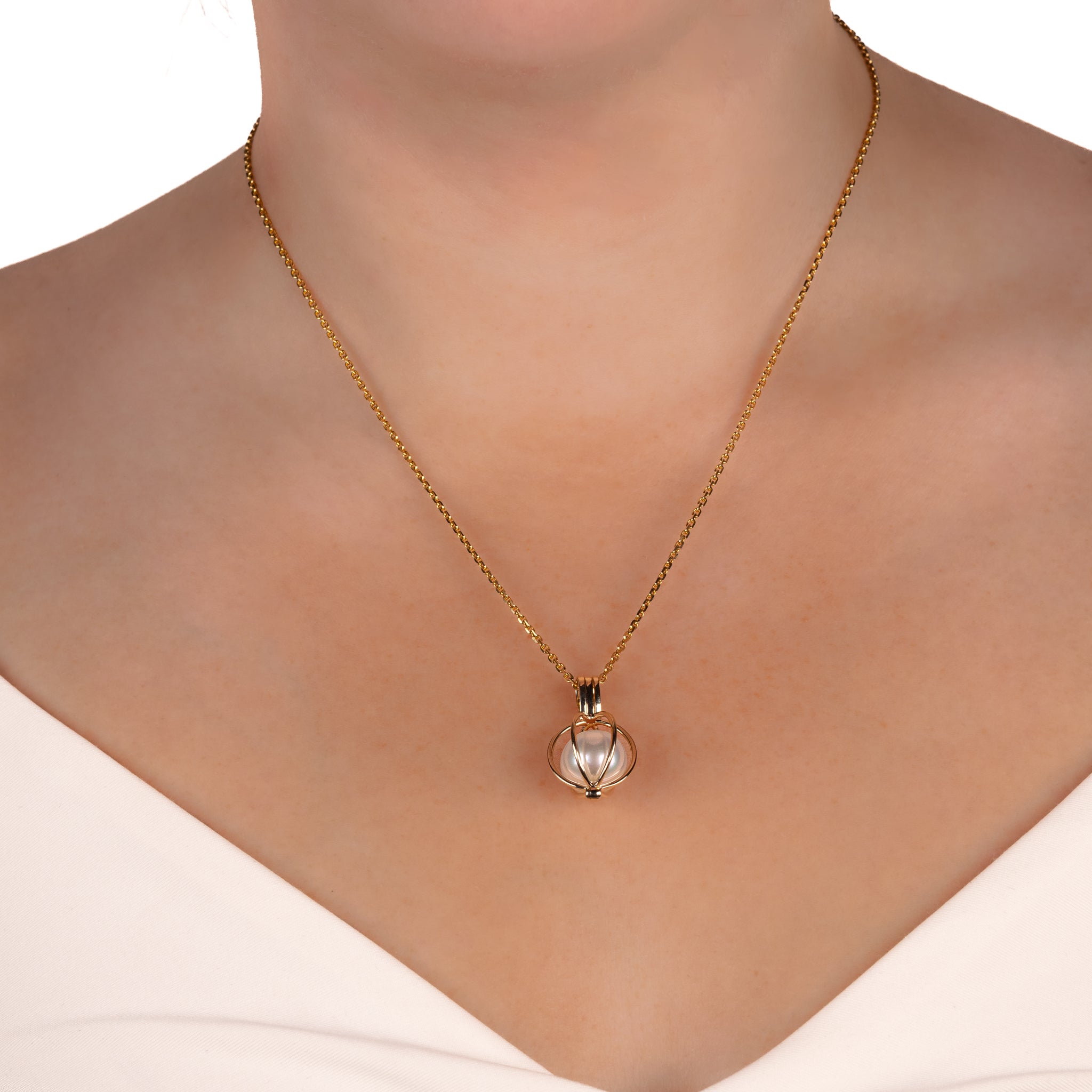9K Yellow Gold Australian South Sea Cultured 10-11mm Cage Pendant on a model