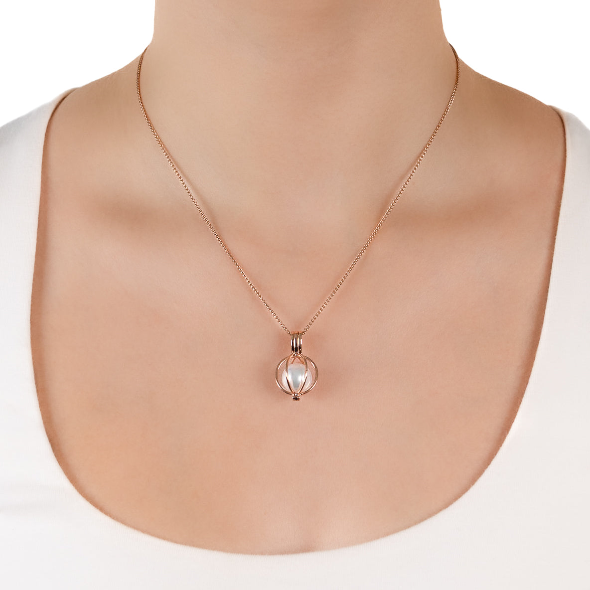 9K Rose Gold Australian South Sea 10-11 mm Cultured Pearl Cage Pendant on a model