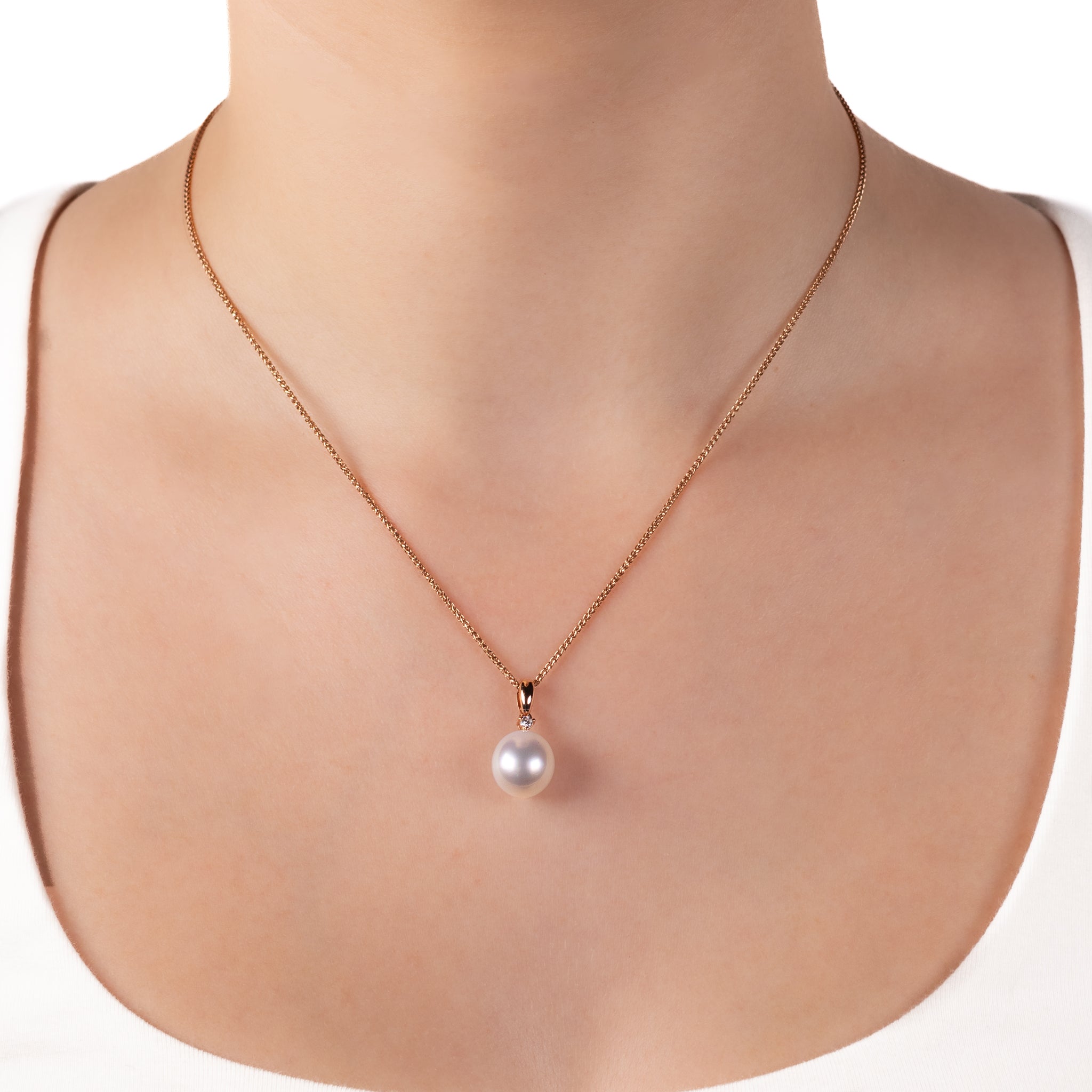 18K Rose Gold Australian South Sea 11-12 mm Cultured Pearl and Diamond Pendant on a model