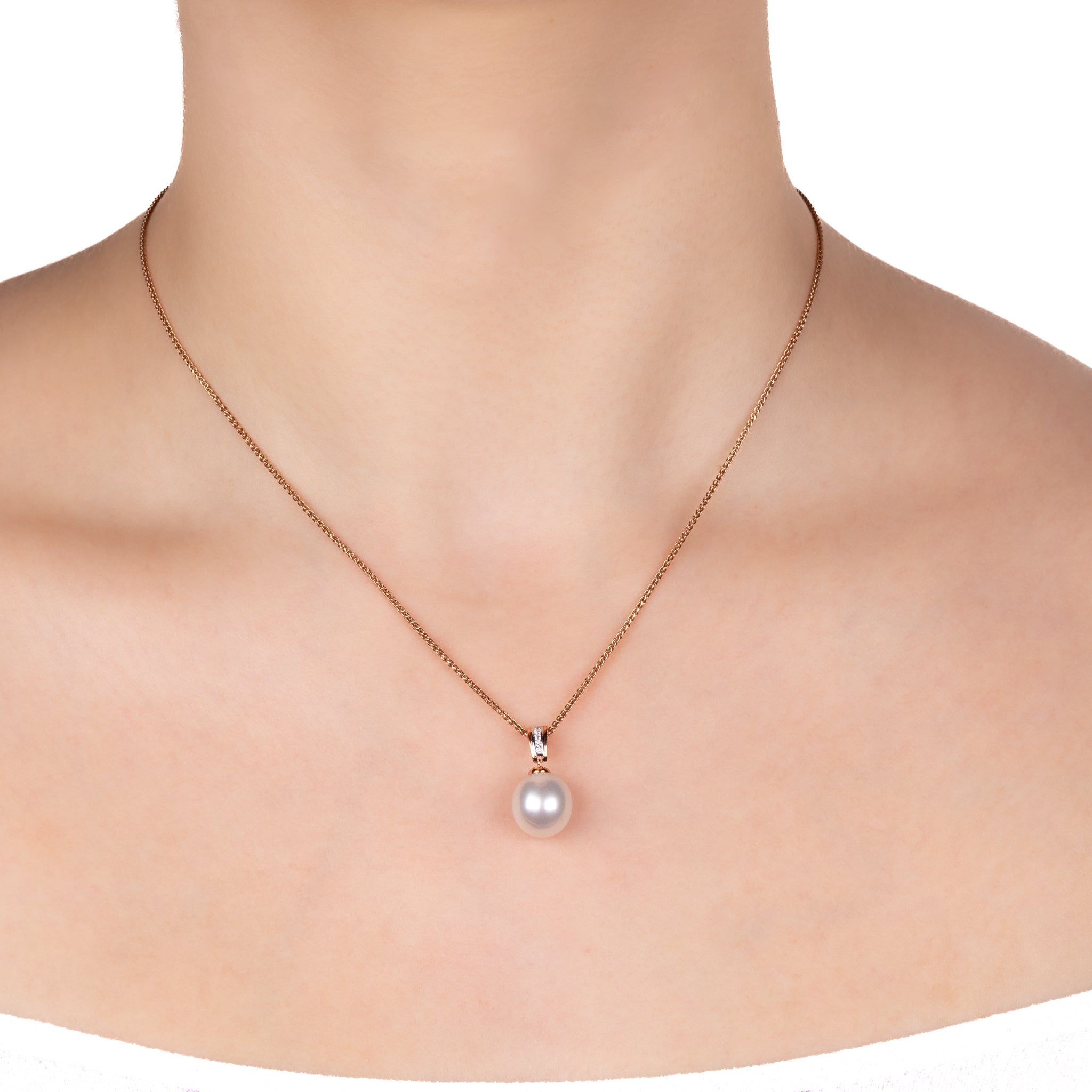 18K Rose Gold Australian South Sea 11-12mm Cultured Pearl and Diamond Pendant on a rose gold chain worn on a model with a white background