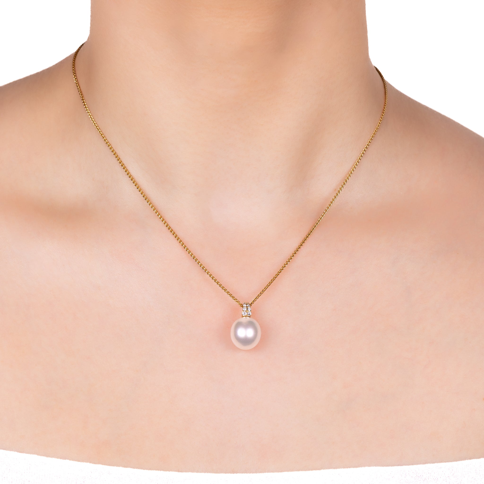 18K Yellow Gold Australian South Sea 11-12 mm Cultured Pearl and Diamond Pendant worn on a model