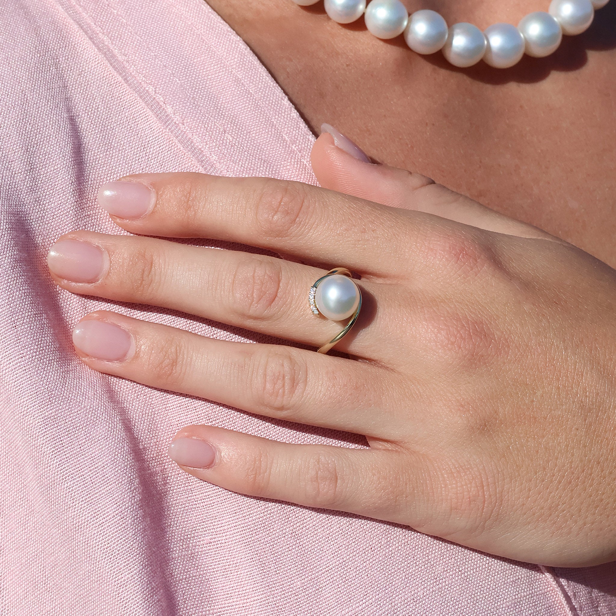 Model Wears 9K Yellow Gold Australian South Sea 10-11mm Cultured Pearl and Diamond Ring for our Rings Category