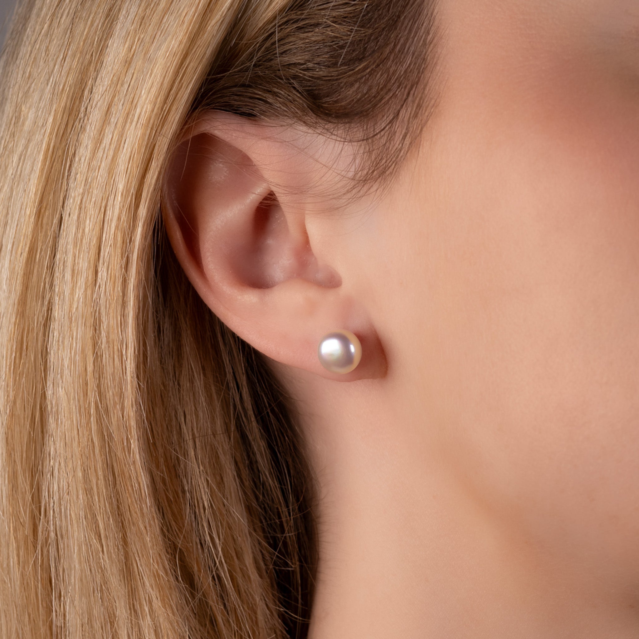 Sterling Silver Freshwater Pearl 8-9 mm Stud Earrings on a model