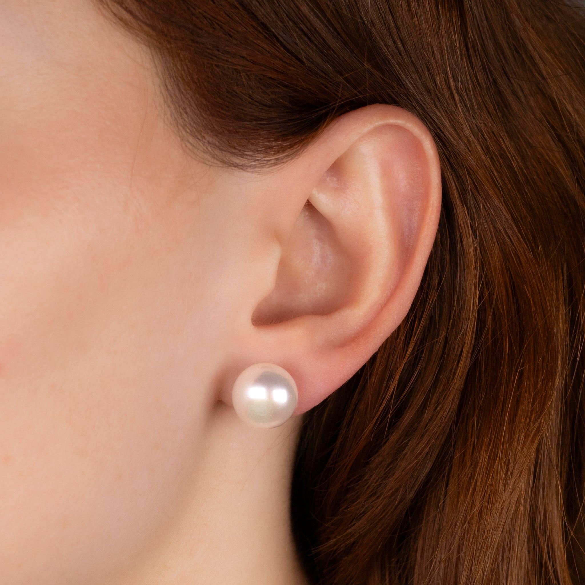 Sterling Silver Freshwater Pearl 8-8.5 & 12-12.5mm Earrings worn on a model