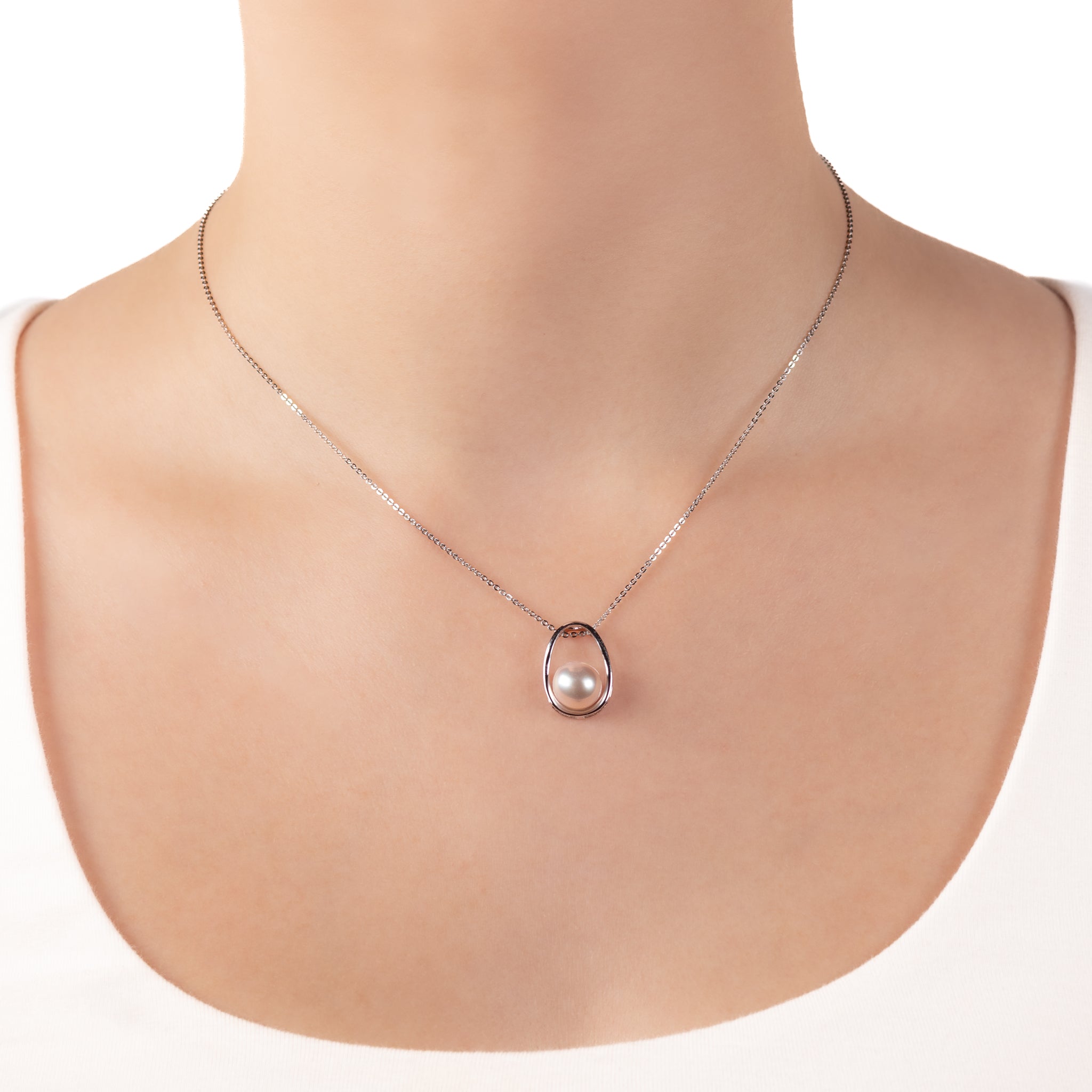 Sterling Silver Freshwater 9-9.5mm Pearl Pendant worn on a model with a white background