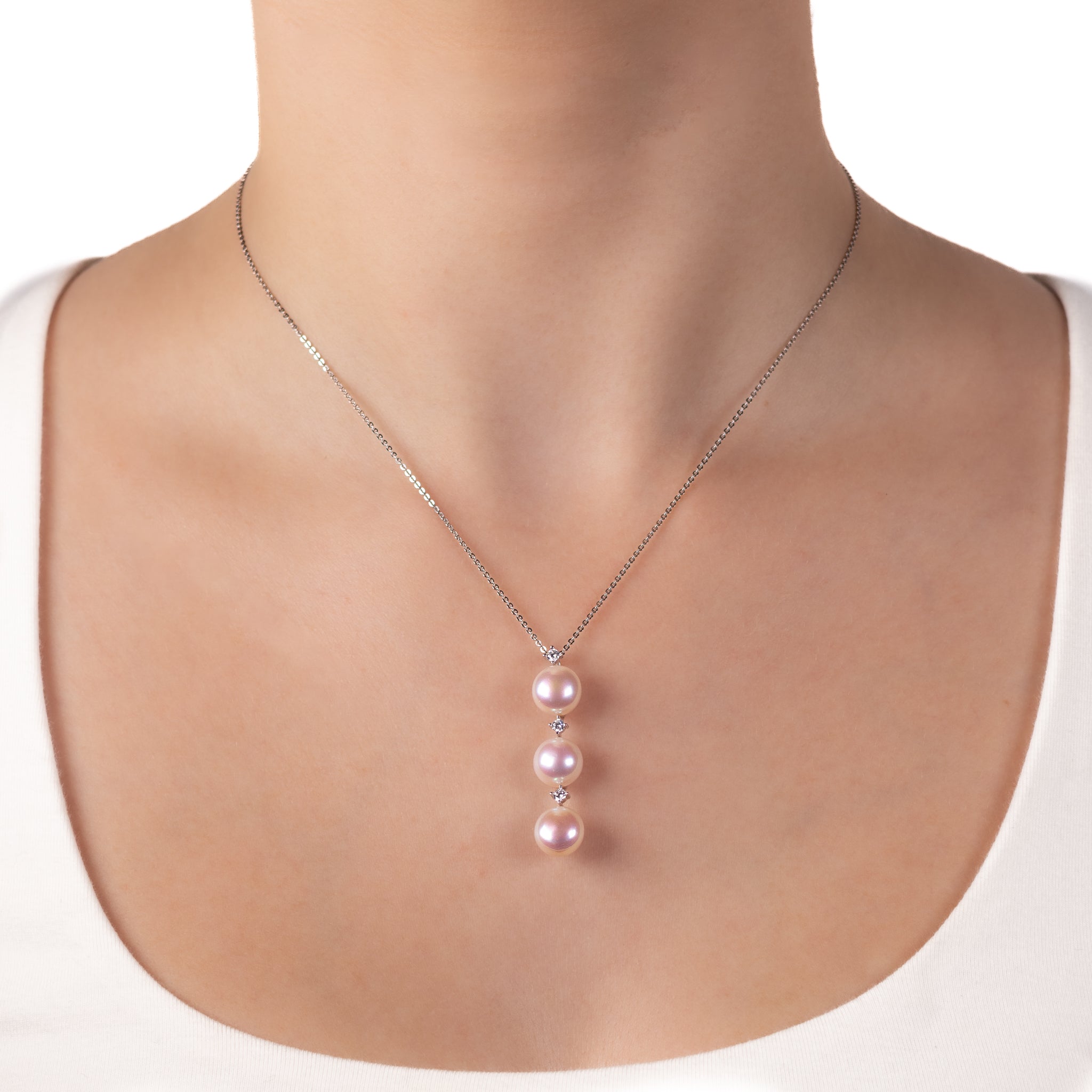 Sterling Silver Freshwater 9-9.5mm Pearls & Cubic Zirconia Pendant worn on a model's neck