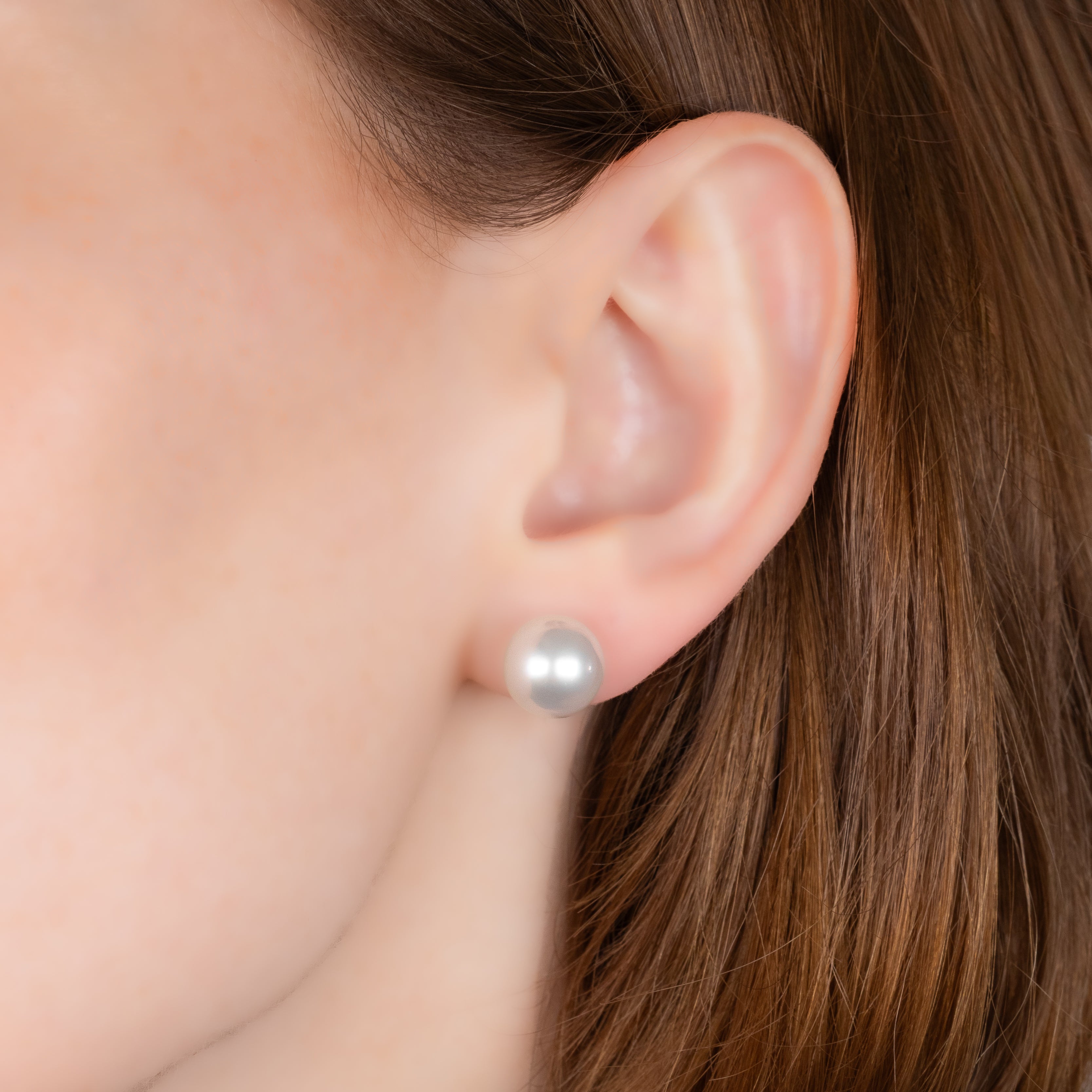 18K Yellow Gold Australian South Sea 10-11 mm Cultured Pearl Stud Earrings on a model