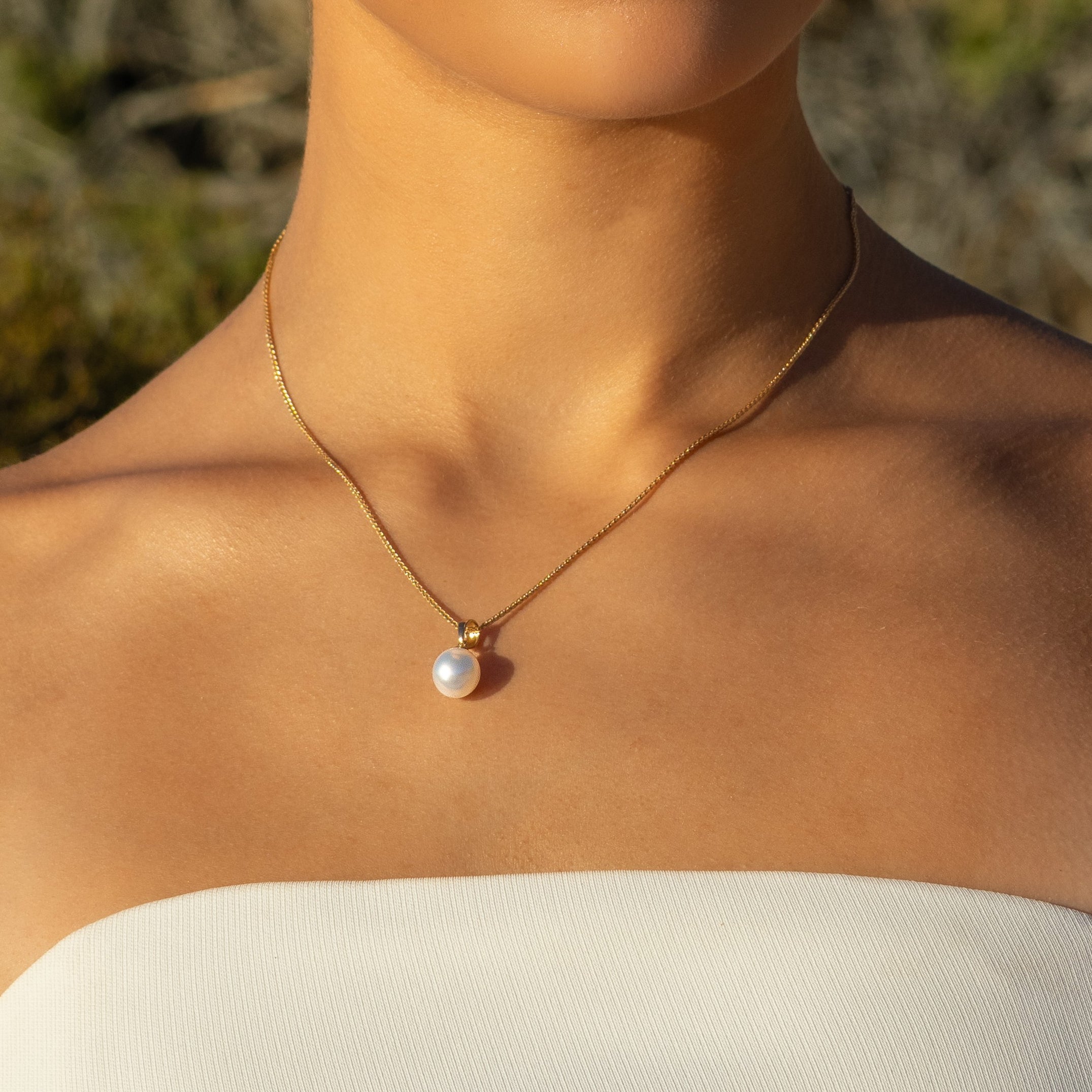 9K Yellow Gold Australian South Sea 9-10 mm Cultured Pearl Pendant on a model