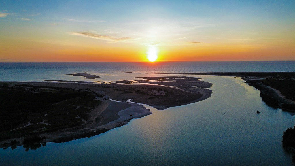 Sunset over a coastal landscape of Broome