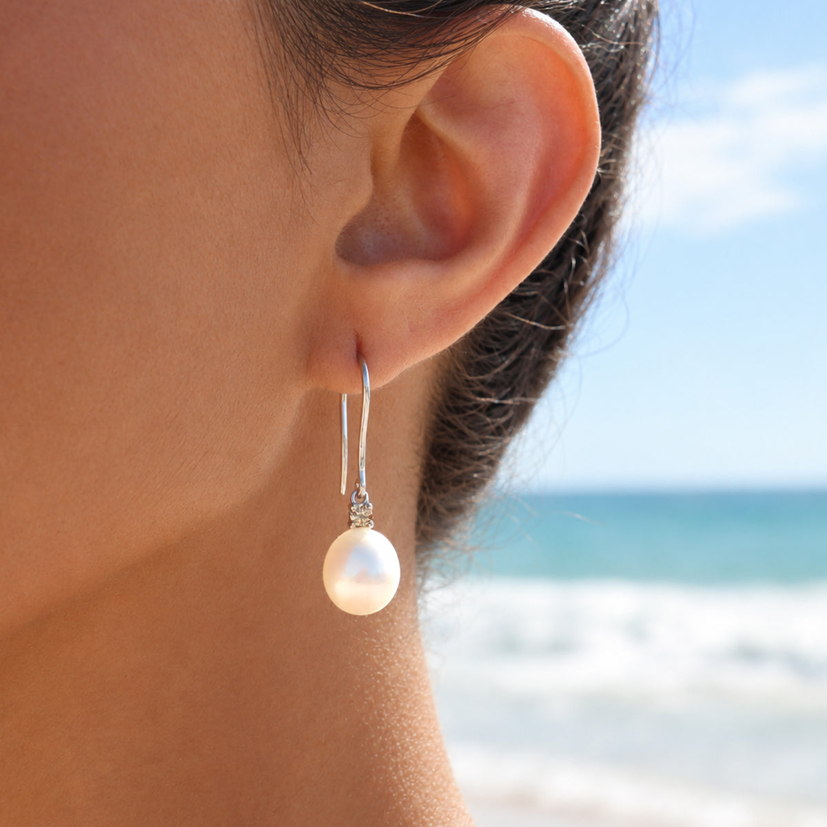 9K White Gold Australian South Sea 10-11mm Cultured Pearl and Argyle Diamond Hook Earrings on model