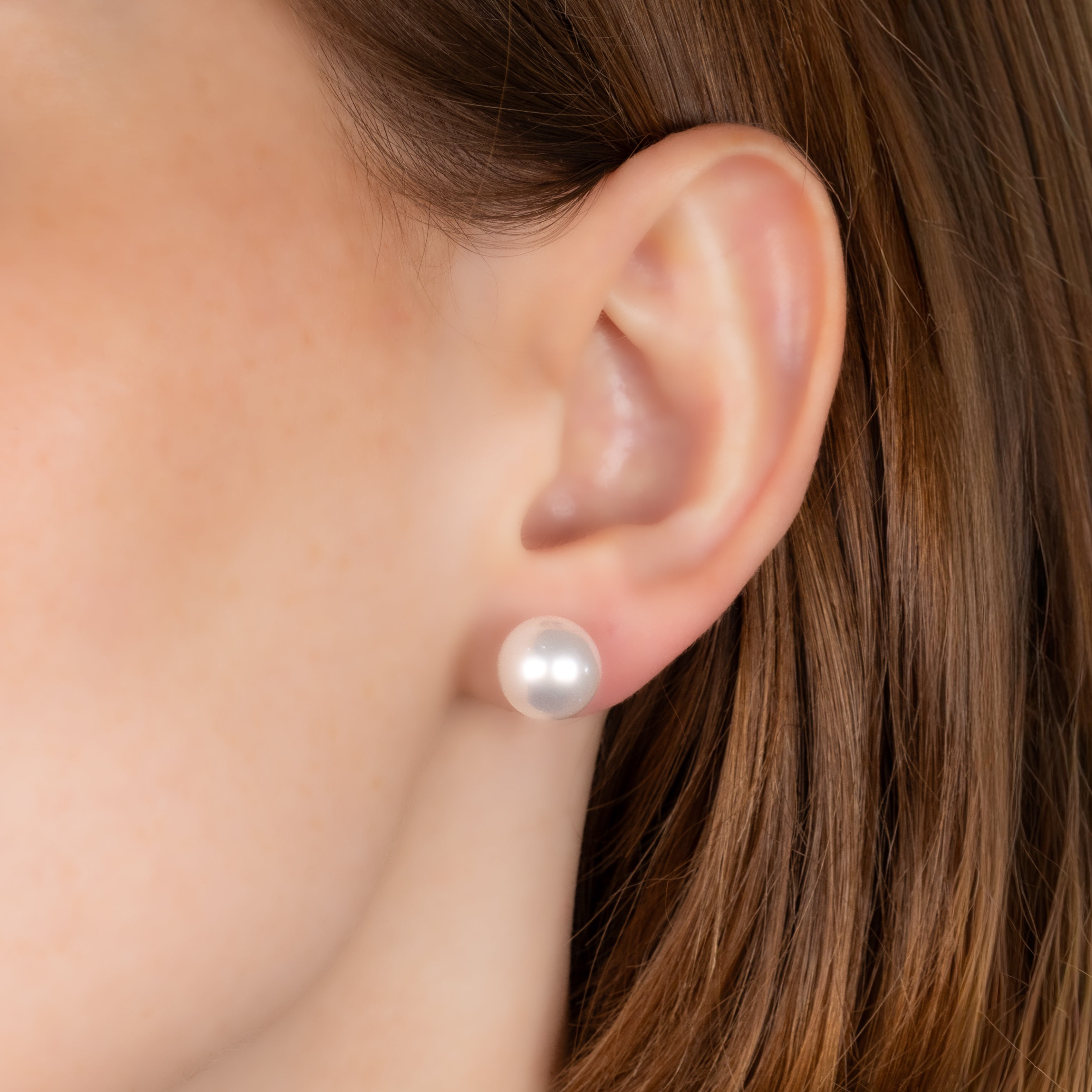 18K White Gold Australian South Sea 10-11 mm Cultured Pearl Stud Earrings on a model