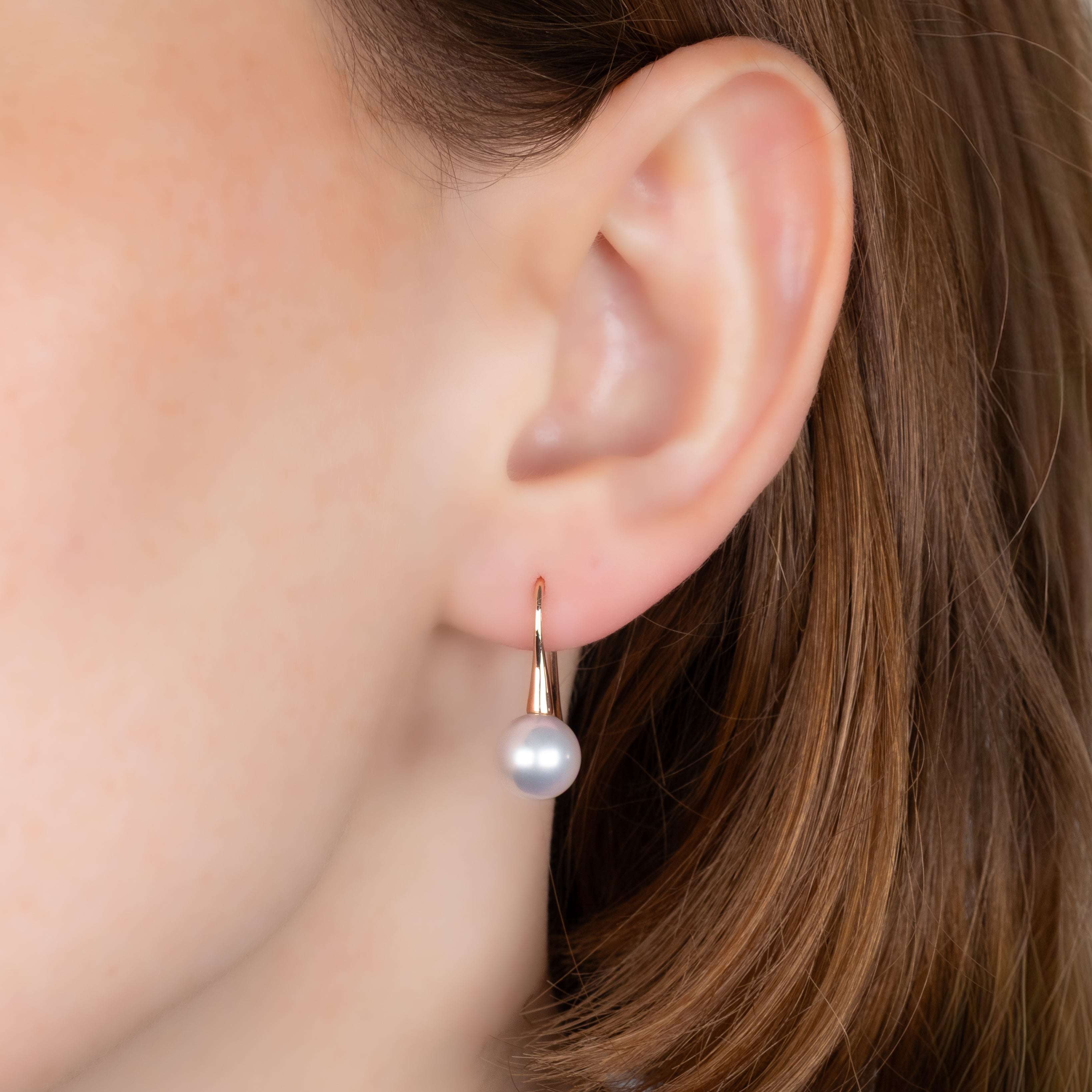 9K Rose Gold Australian South Sea 8-9 mm Cultured Pearl Hook Earrings on a model
