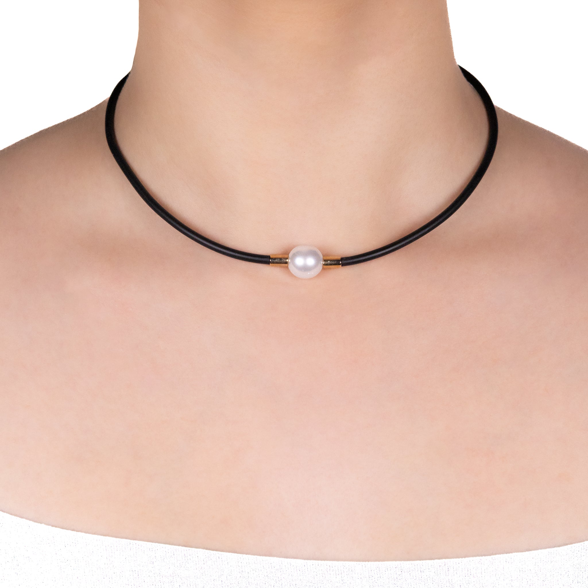 Black neoprene pearl necklace on a model against a white background