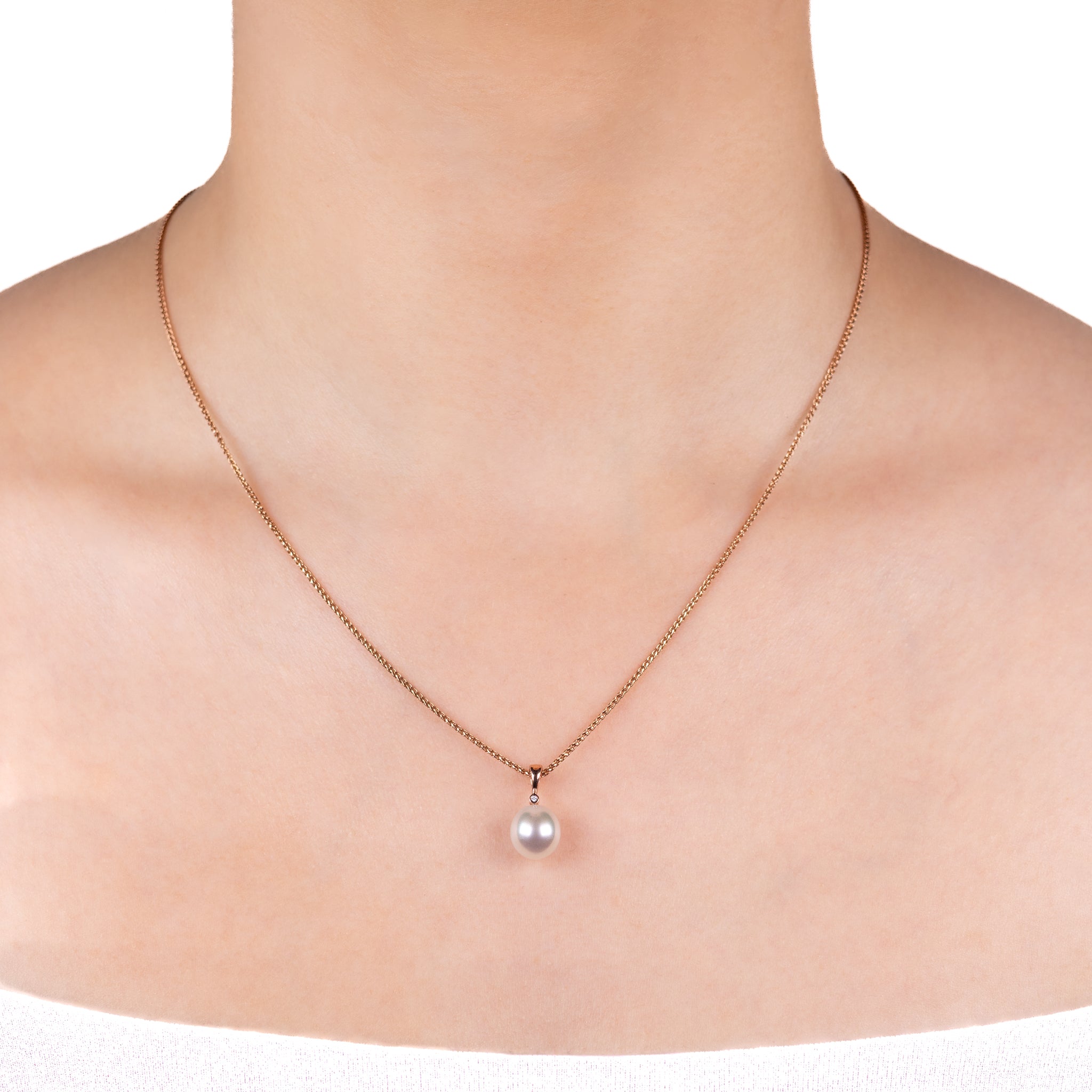 9K Rose Gold Australian South Sea 9-10 mm Cultured Pearl and Diamond Pendant worn on a model with a white background