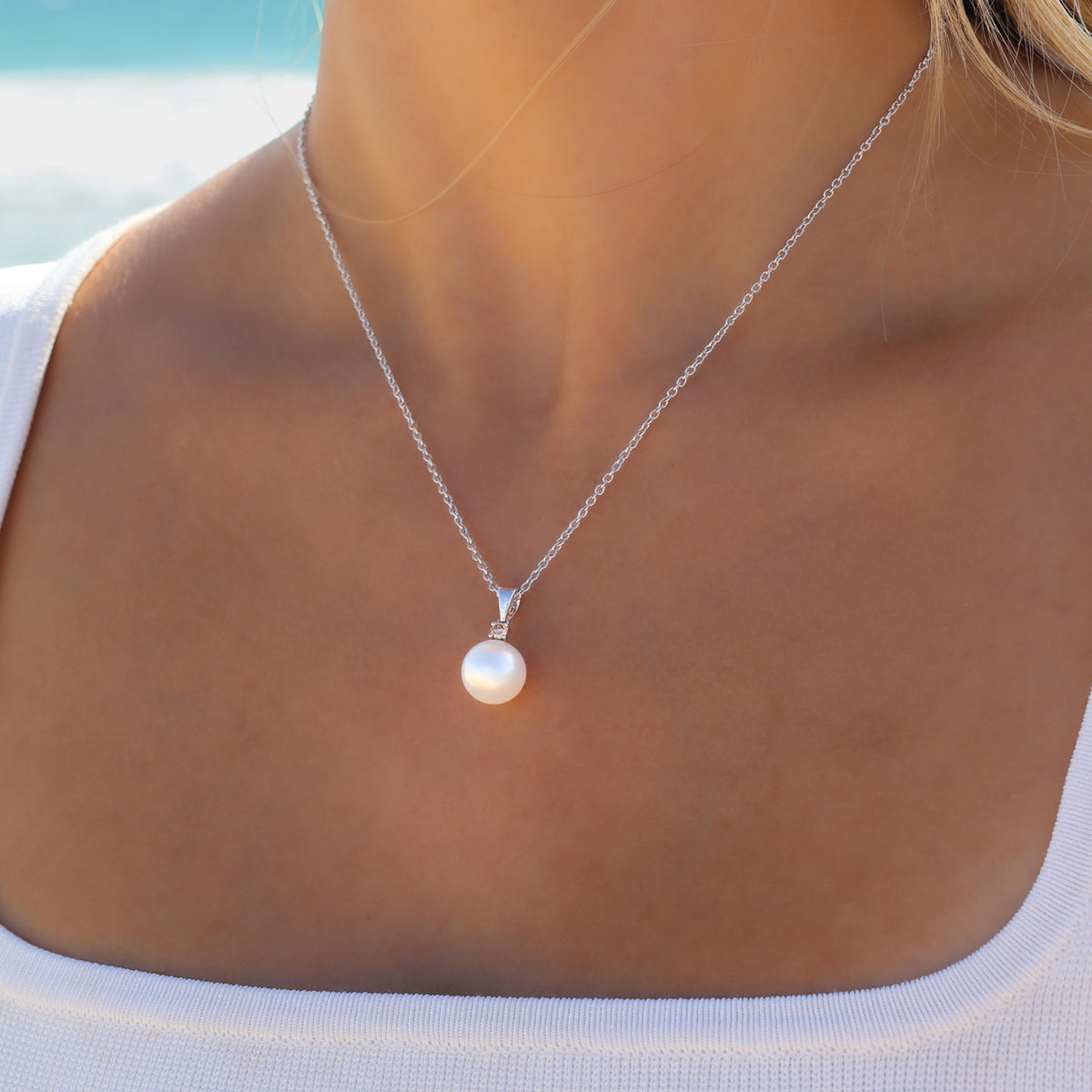 9K White Gold Australian South Sea 11-12 mm Cultured Pearl and Argyle Diamond Pendant - on model