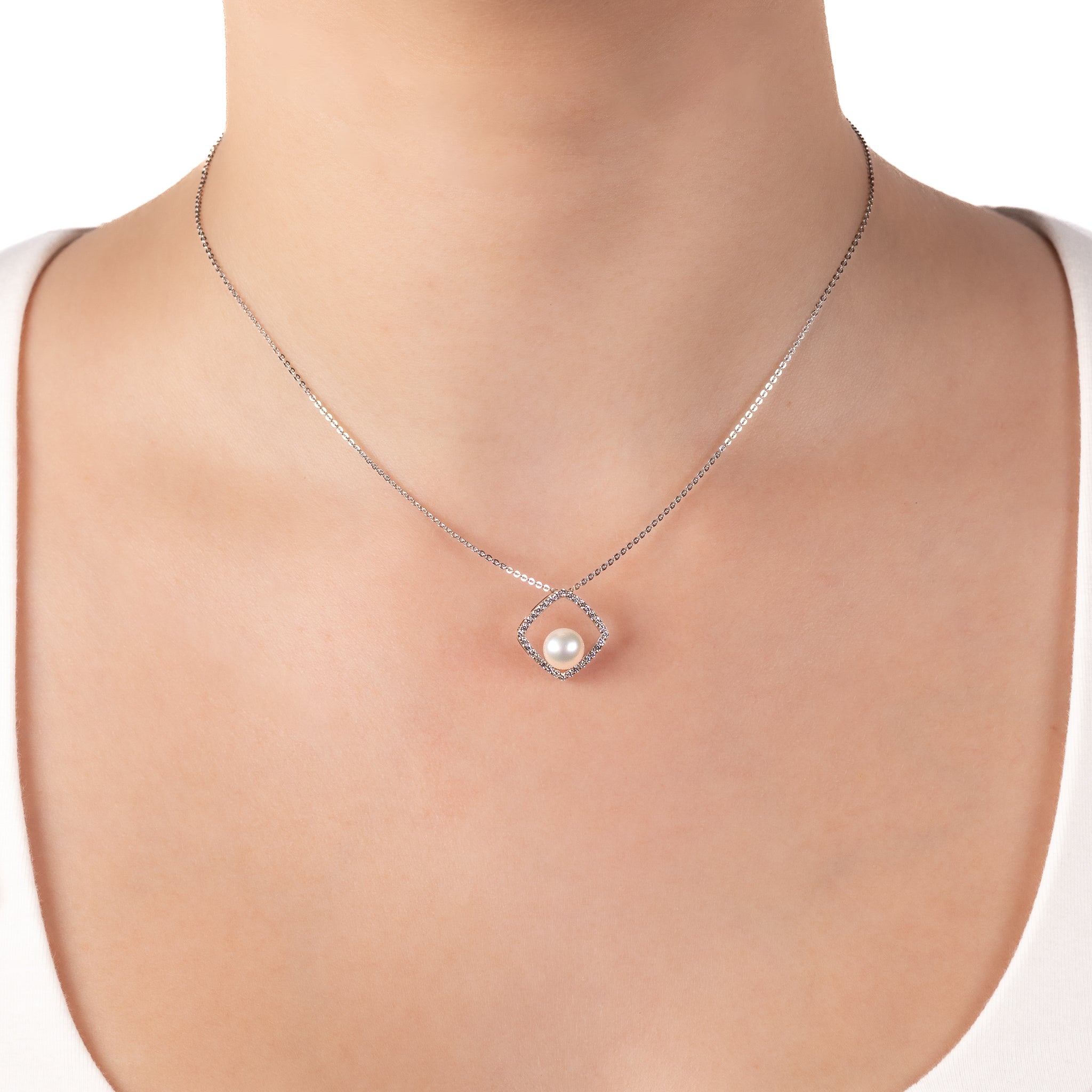 Sterling Silver 7-7.5mm Freshwater Pearl and Cubic Zirconia Pendant on a model