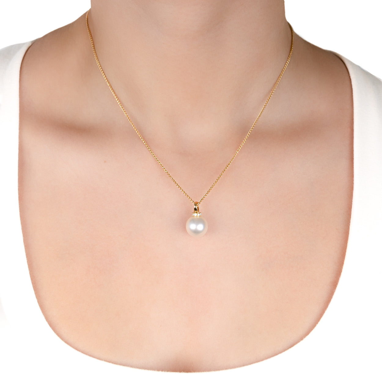 18K Yellow Gold Australian South Sea 12-13mm Cultured Pearl & Diamond Pendant on a model