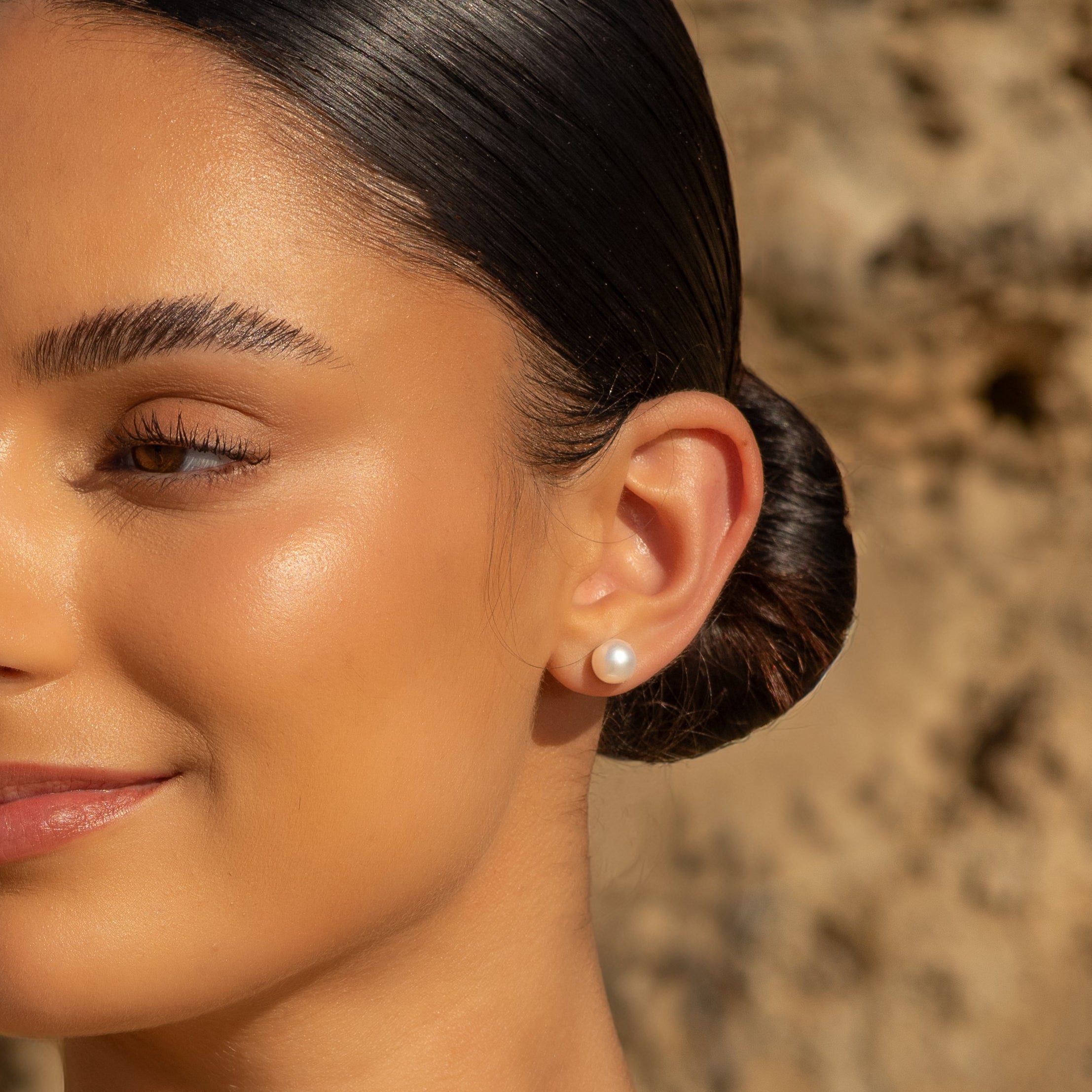 Sterling Silver Australian South Sea 8-9 mm Cultured Pearl Stud Earrings on a model