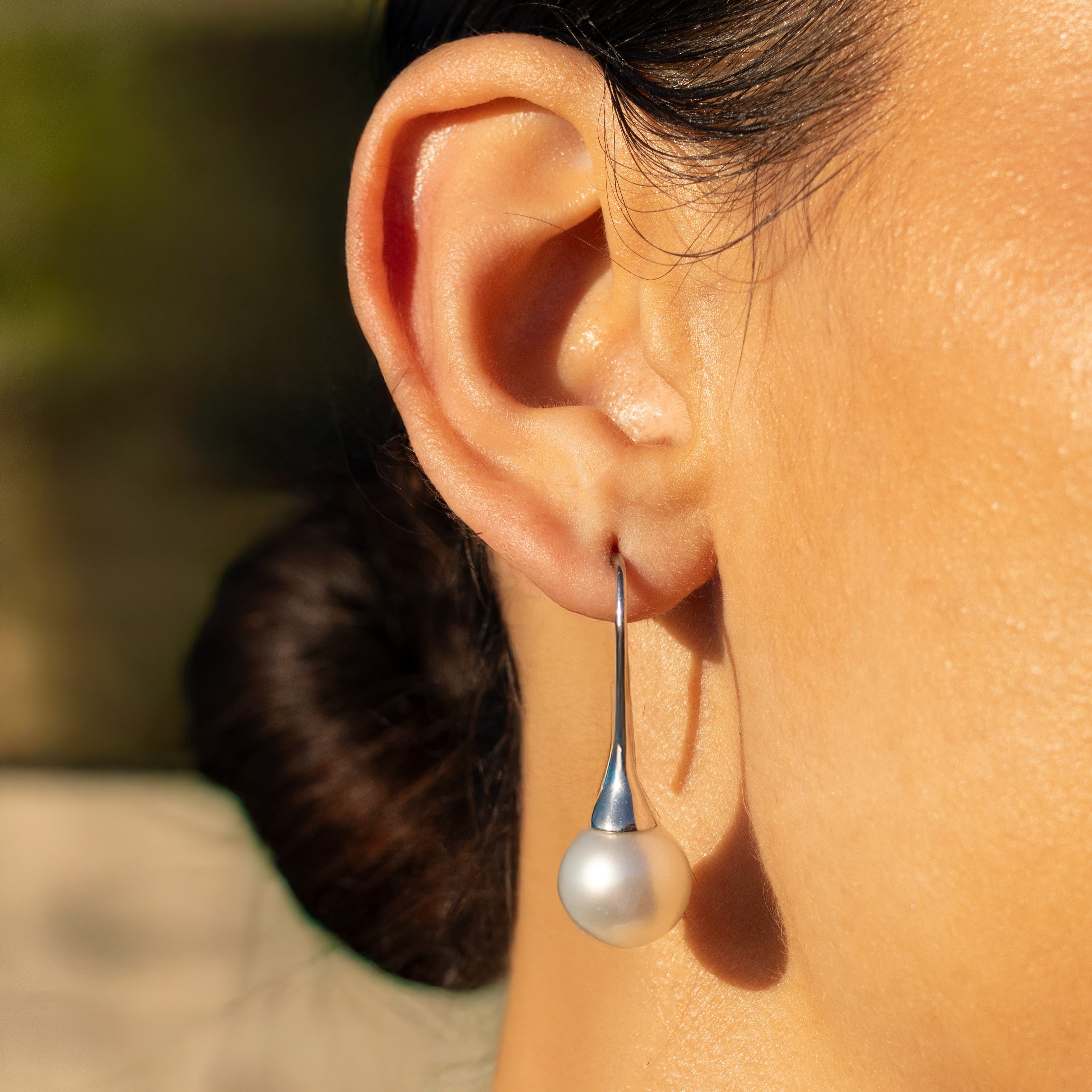 Sterling Silver Australian South Sea Cultured 12-13mm Pearl Hook Earrings on a model