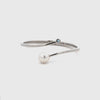 Silver bracelet with a pearl and gemstone on a white background 360 degree video