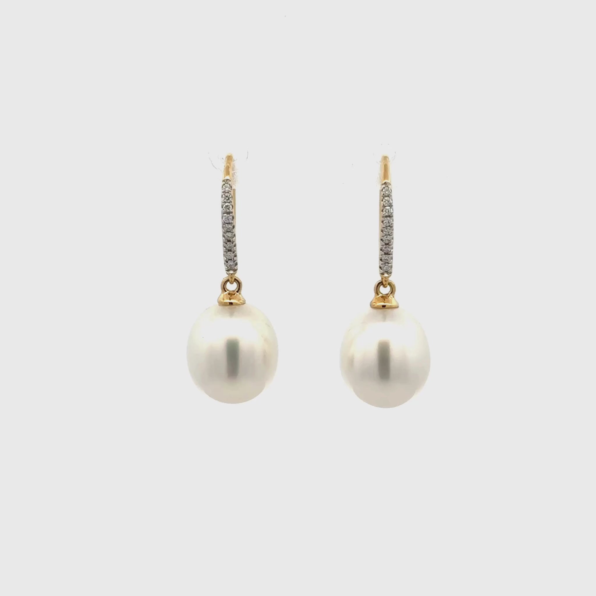 18K Yellow Gold Australian South Sea 10-11 mm Cultured Pearl and Diamond Hook Earrings 360 degree view with a white background