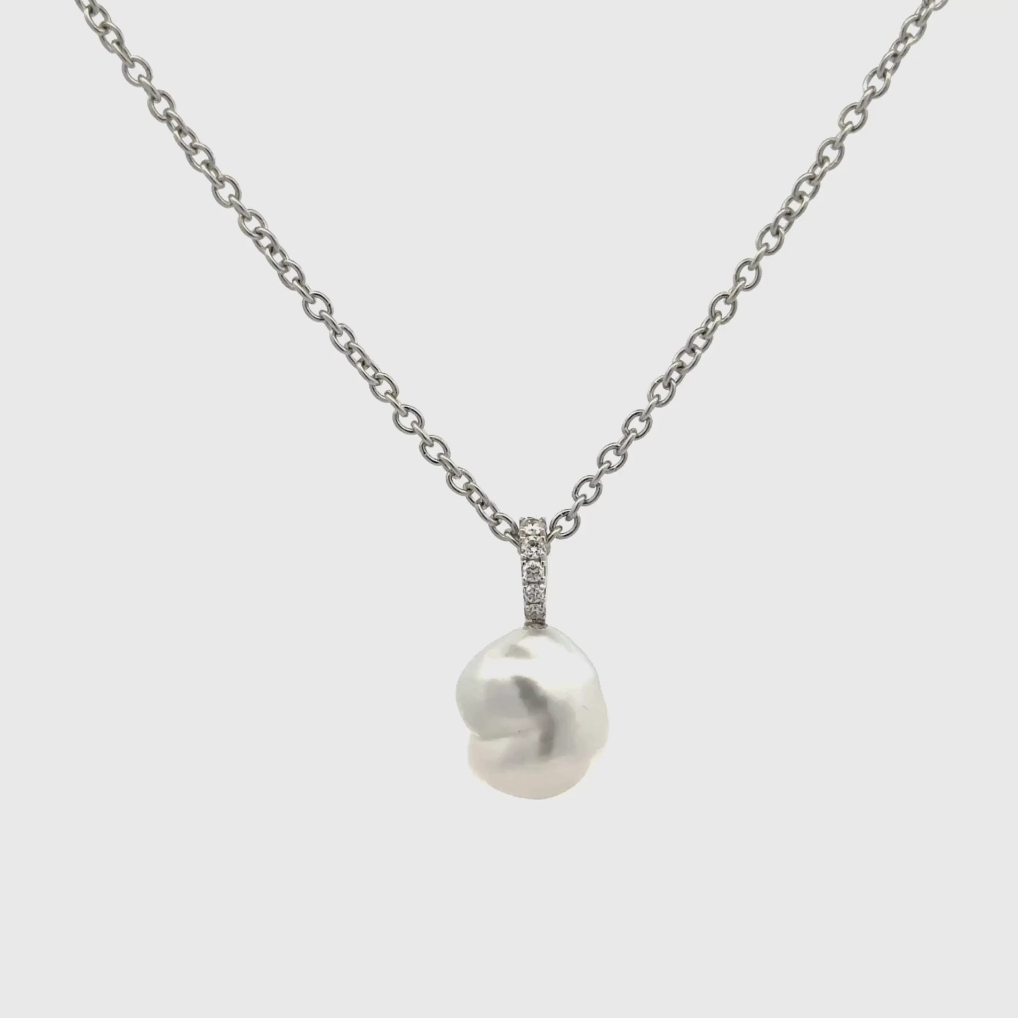 18K White Gold Australian South Sea 1.0g Keshi Pearl and Diamond Pendant 360 degree view on a white background
