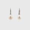 Sterling Silver Freshwater Pearl 8-9 mm White Drop & Cubic Zirconia Hook Earrings on a white background, 360 degree view