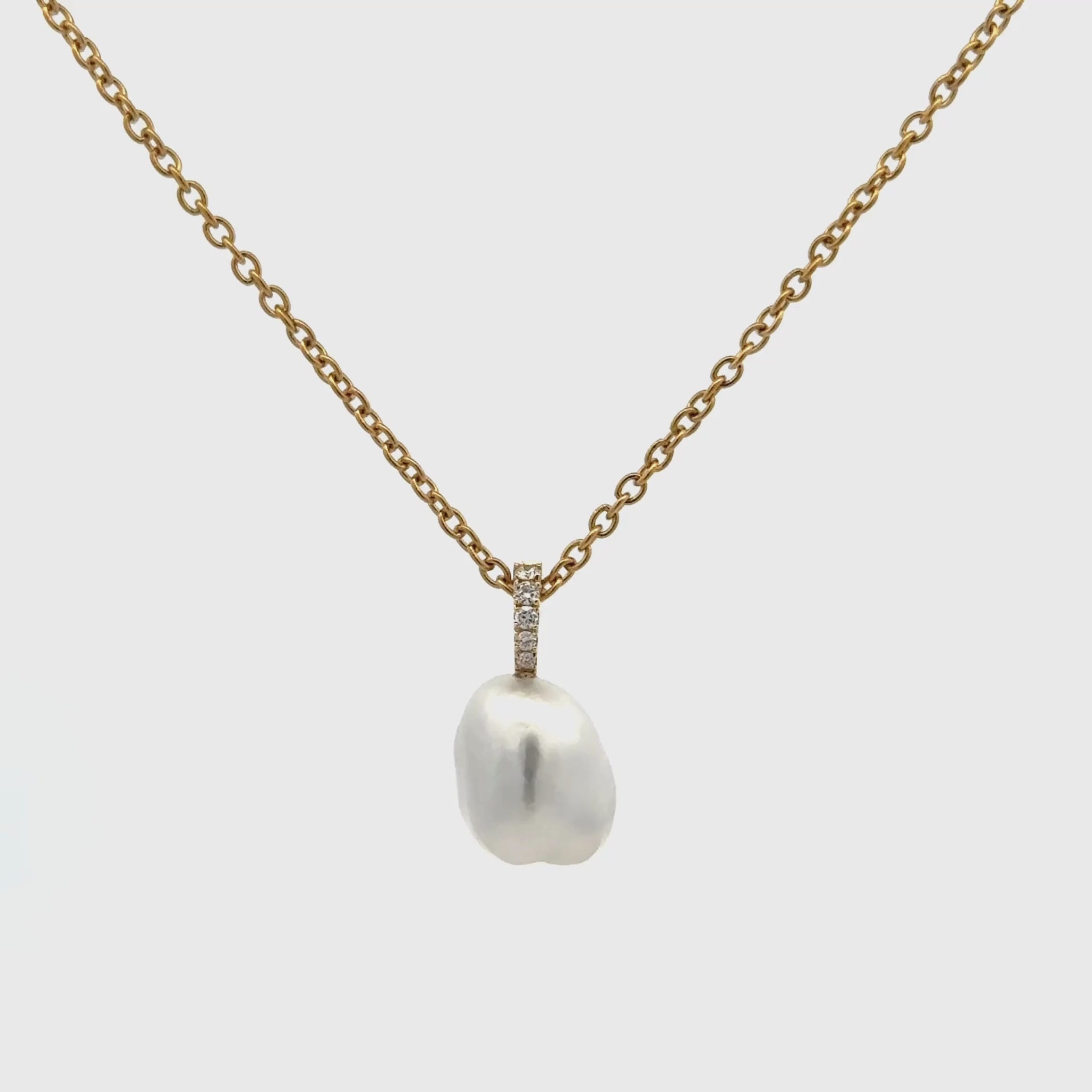 18K Yellow Gold Australian South Sea 1.3g Keshi Pearl and Diamond Pendant 360 degree view on a white background