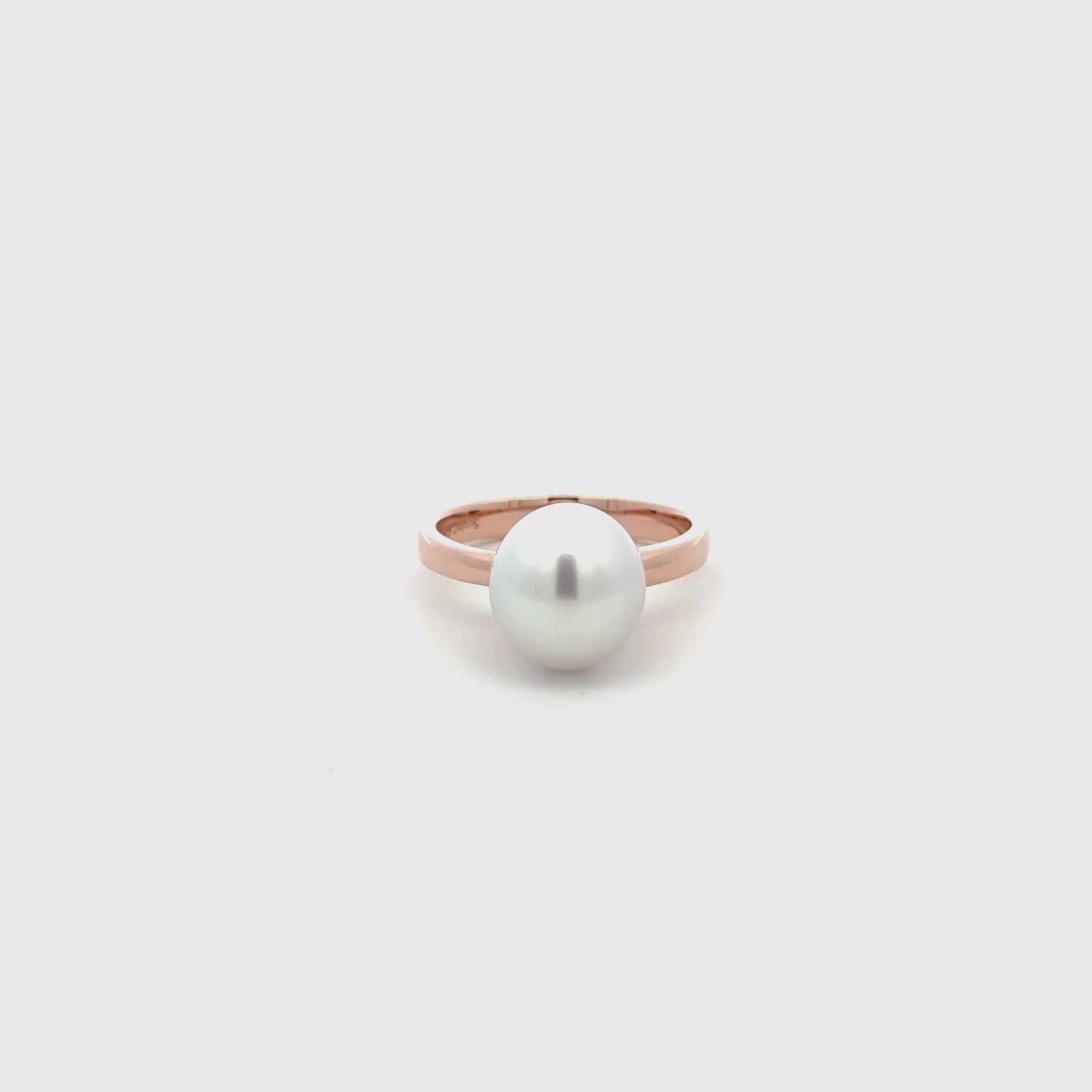 360 view of a lying down 9K Rose Gold Australian South Sea 9-10mm Cultured Pearl Ring on a white background